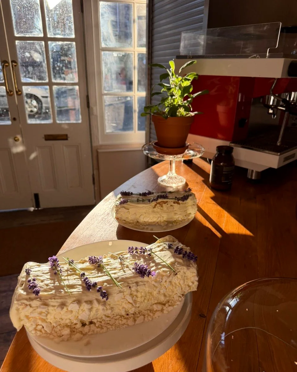 Fresh cakes and bakes on the fore. counter
