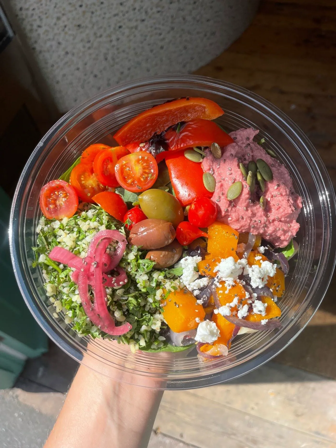 Sunshine bowl with grains, vegetables and bright seasonal toppings